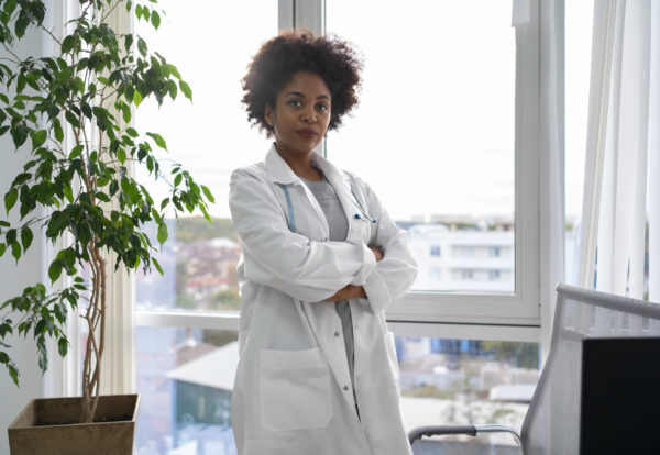 medium-shot-doctor-wearing-white-coat